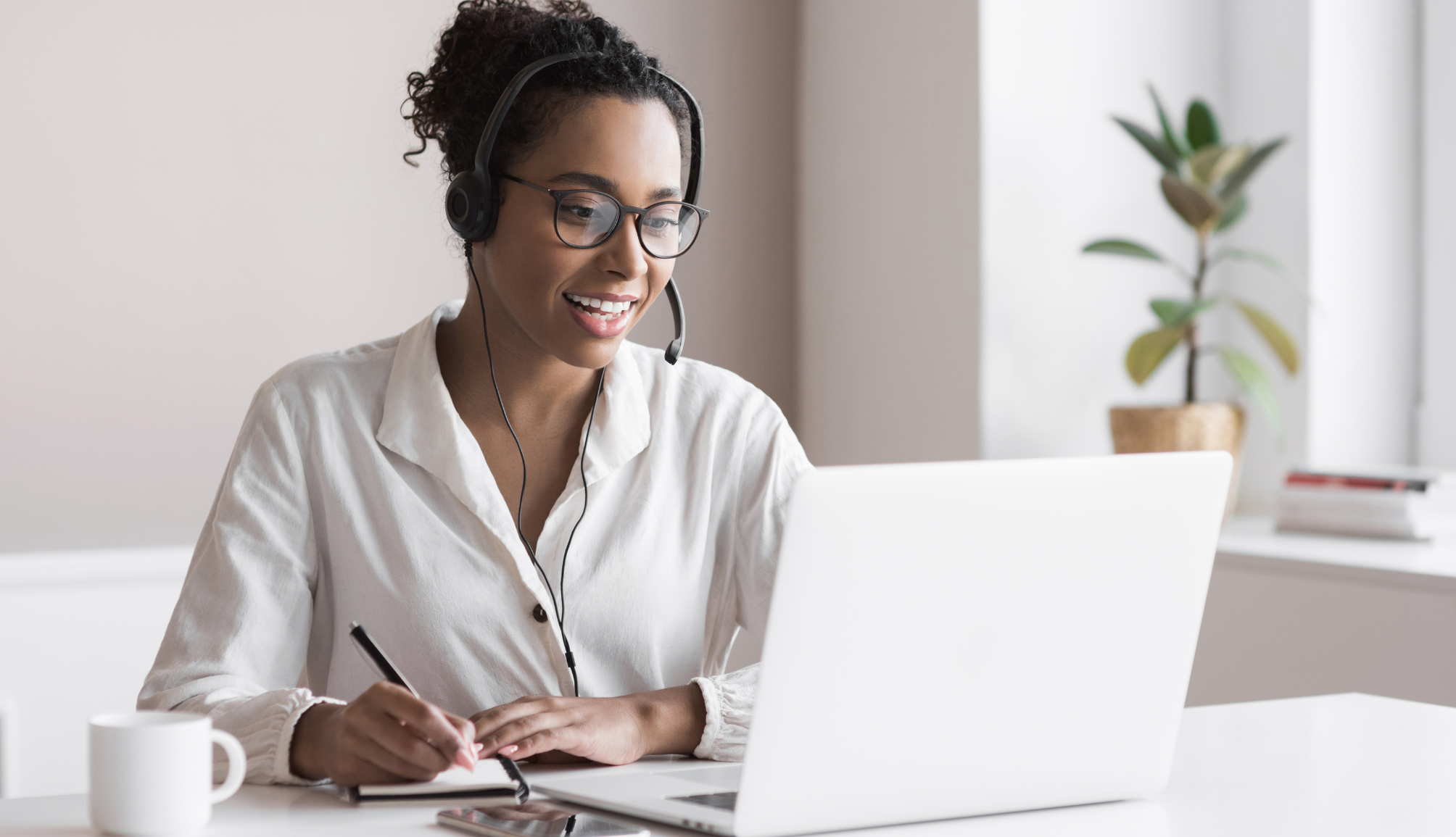 young-black-male-entrepreneur-working-with-laptop-2022-12-16-08-45-15-utc-min